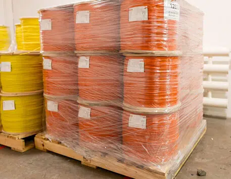 Wrapped wire spools on pallets