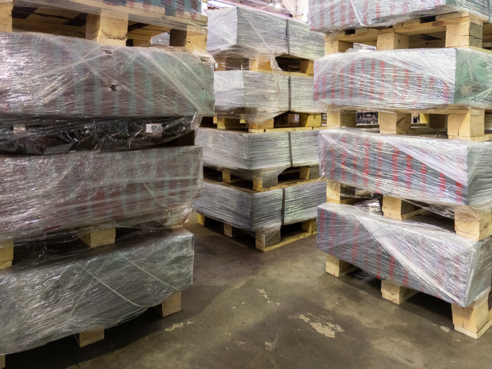 stretch wrapping doors and windows with a pallet wrapper offers cost savings