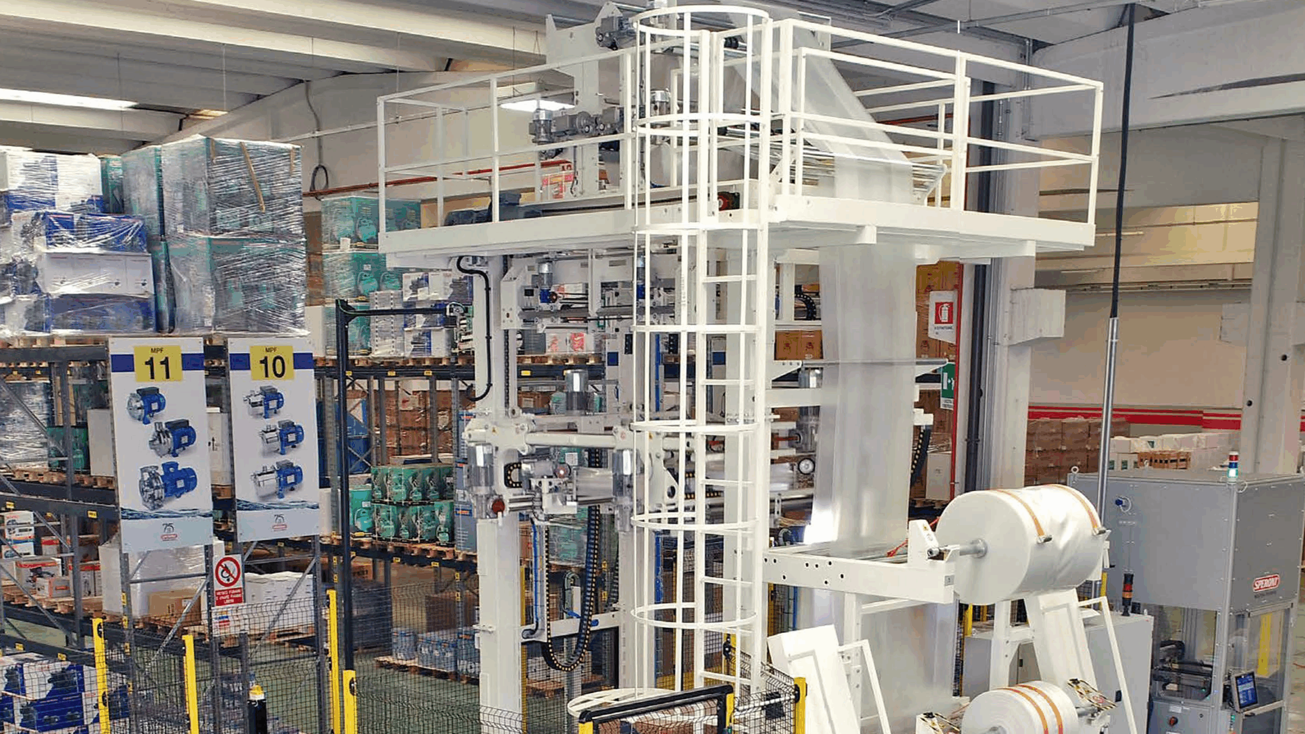 A SH-FA-6000 stretch hooding machine from Handle It wrapping boxes on a pallet.